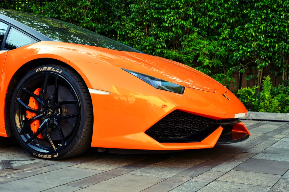 A high-gloss orange supercar